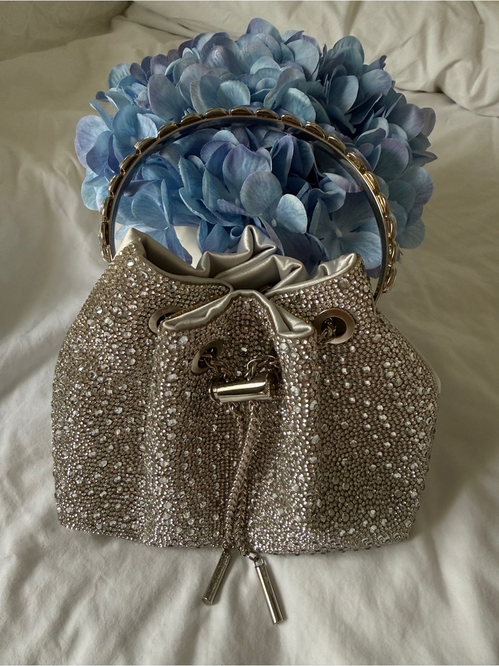 Crystal-Embellished Drawstring Bucket Bag in Silver